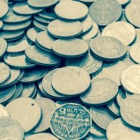 Close up and selective focus point on coin textures - vintage effect